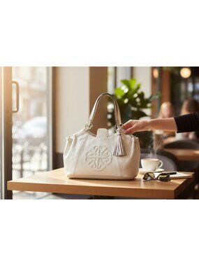 Solina White Faux Leather Shoulder Bag with Embroidered Detail & Tassel Accent -